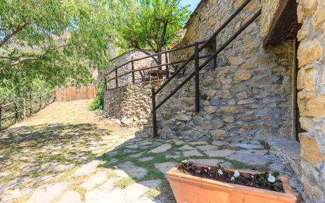 Steps down to pool and barcecue area